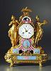 A magnificent late Louis XVI gilt bronze and polychrome enamel mantle clock